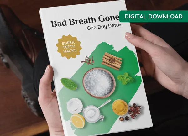 ProDentim bonus e-guide Bad Breath Gone, One Day Detox, held in two hands
